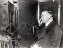 Photo of Herbert Hoover using television.